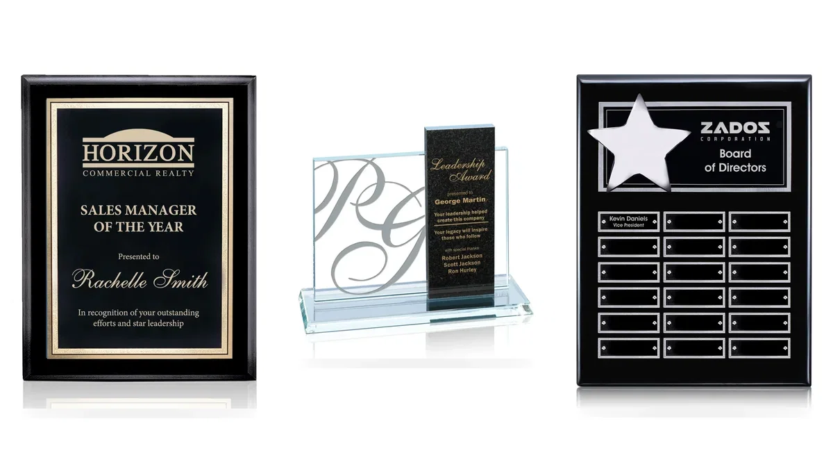 Three engraved award plaques showing sample recognition and appreciation wording