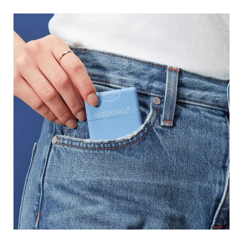 Noshinku 0.6 oz Refillable Pocket Hand Sanitizer in use