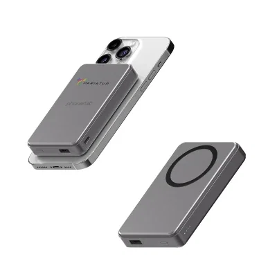 Gray wireless battery pack that snaps magnetically to the back of a phone