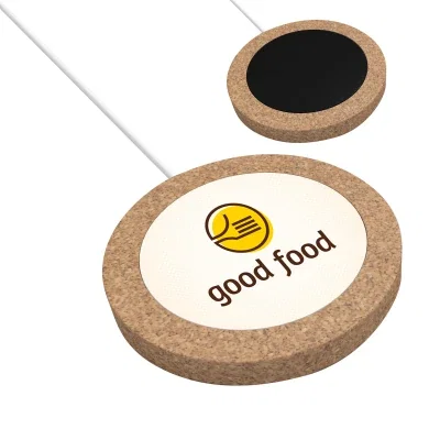 Wireless charging pad topped with a natural cork surface