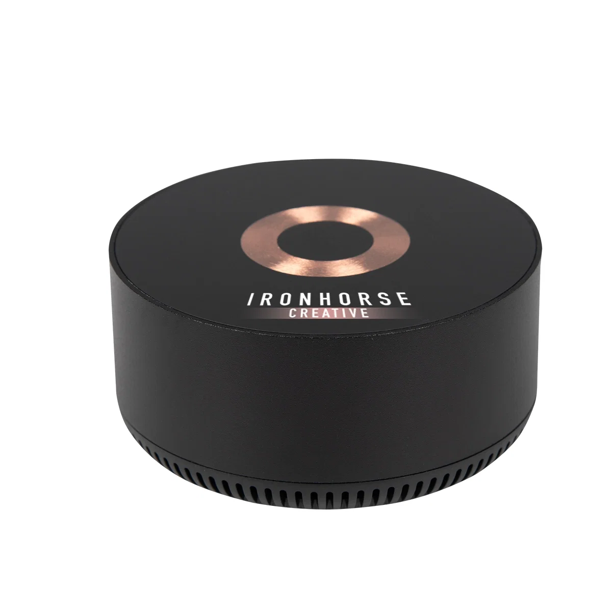 Wireless charging pad with a glass top and built-in speaker