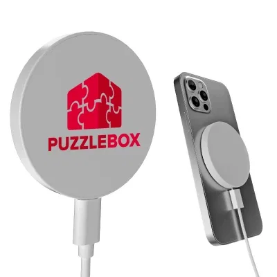Attached to the back of a phone while charging