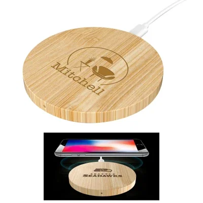 Round bamboo wireless charger with a natural wood grain top