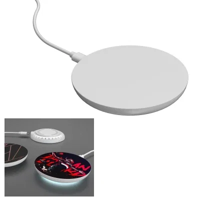 Phone charging flat on the disc shaped pad