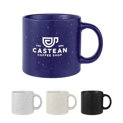 Speckled mug with a curved handle and wide drinking rim