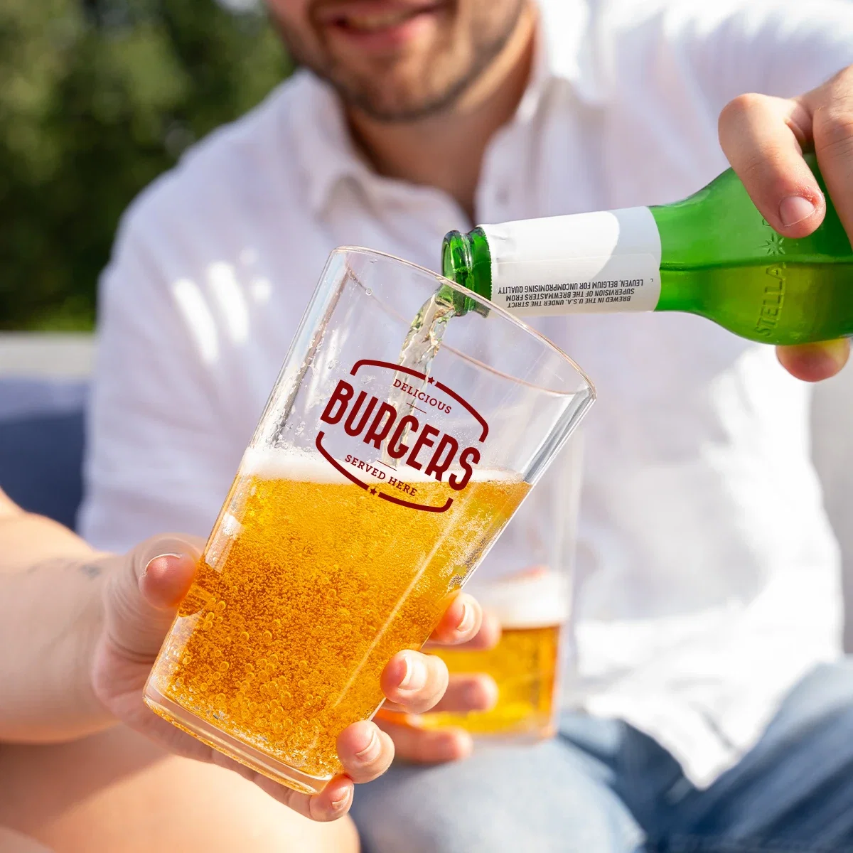 16 Oz. Silipint® Crystal Clear Silicone Pint Glass held in hand