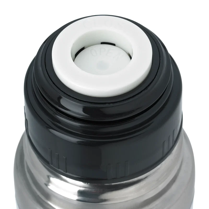 Thermos laid on its side across the frame