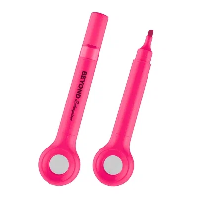 Highlighter with a built-in magnifier along the barrel