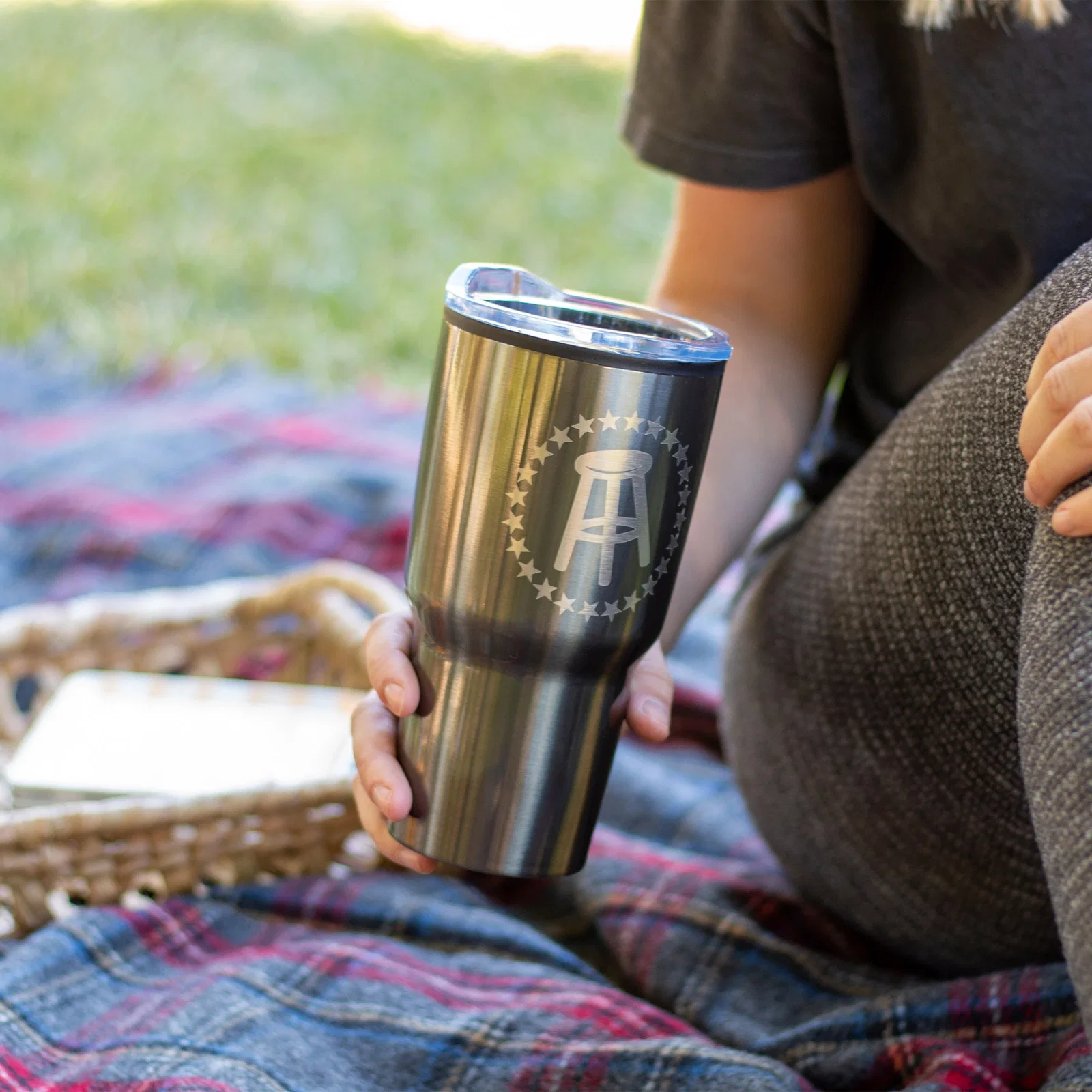 20 oz. Econo-Stainless Steel Tumbler held in hand