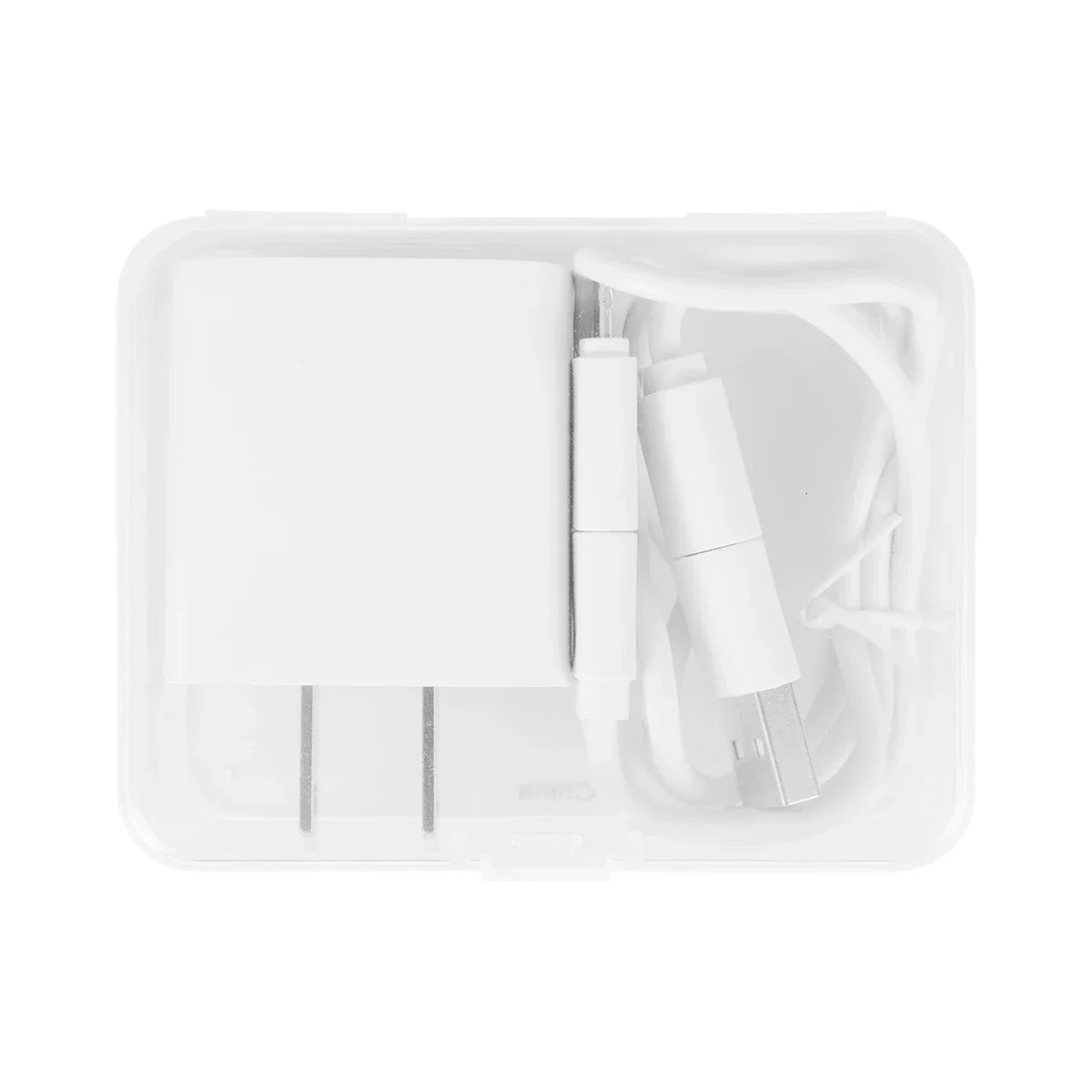 Cord coiled neatly within its travel box