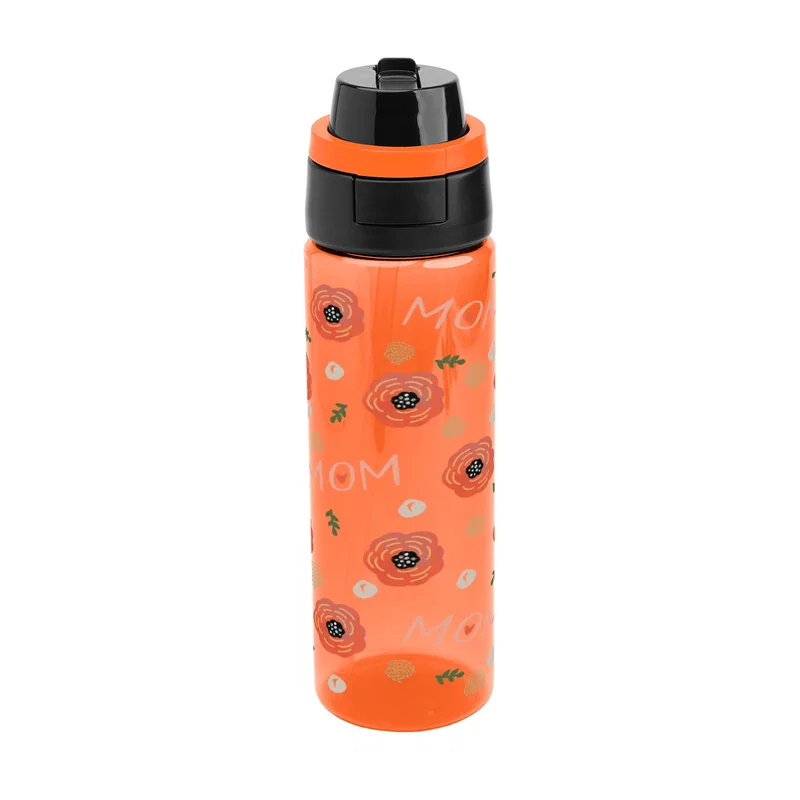 Empty bottle standing beside its detached cap