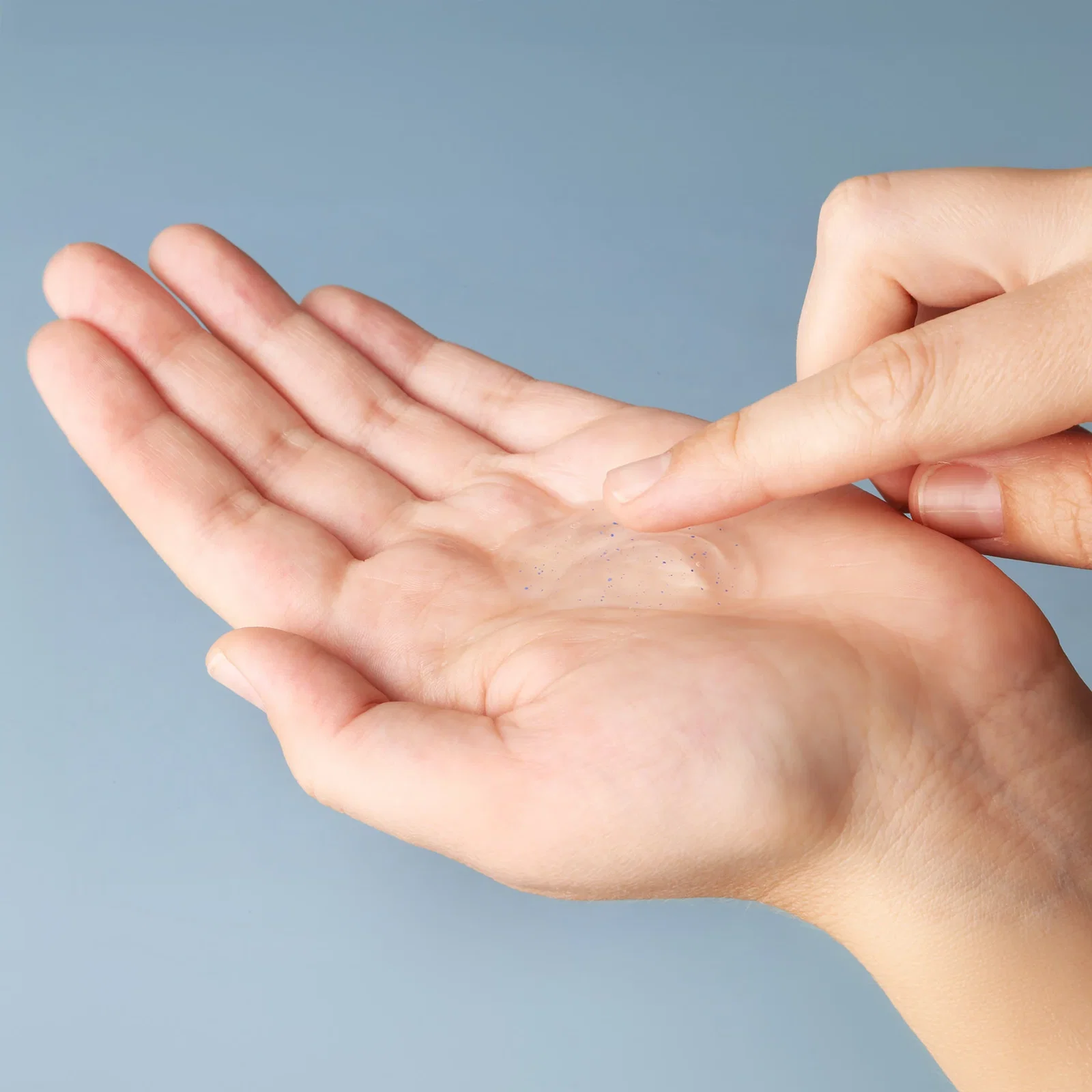 2oz Travel Gel Hand Sanitizer With Moisturizing Beads in use