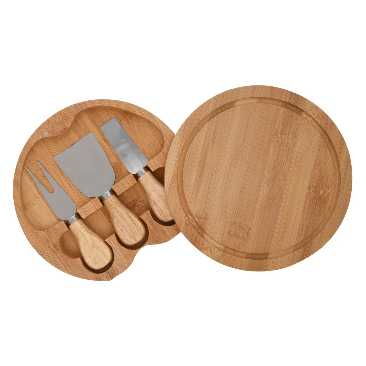 Three cheese tools laid out beside the wooden serving round