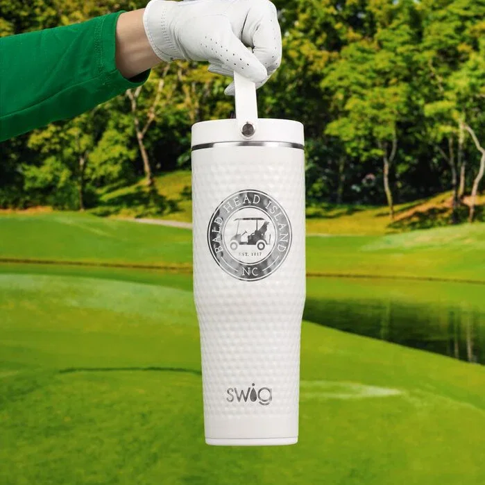 30 Oz. Swig Life™ Golf Ball Tumbler held in hand