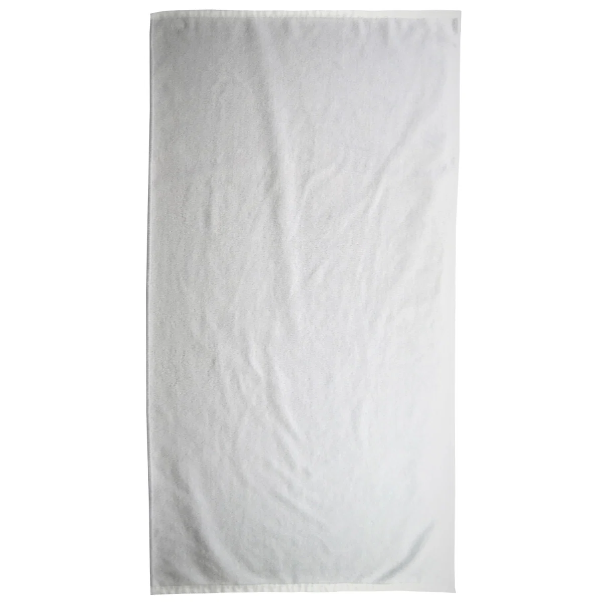 White terry fabric folded into a neat stack