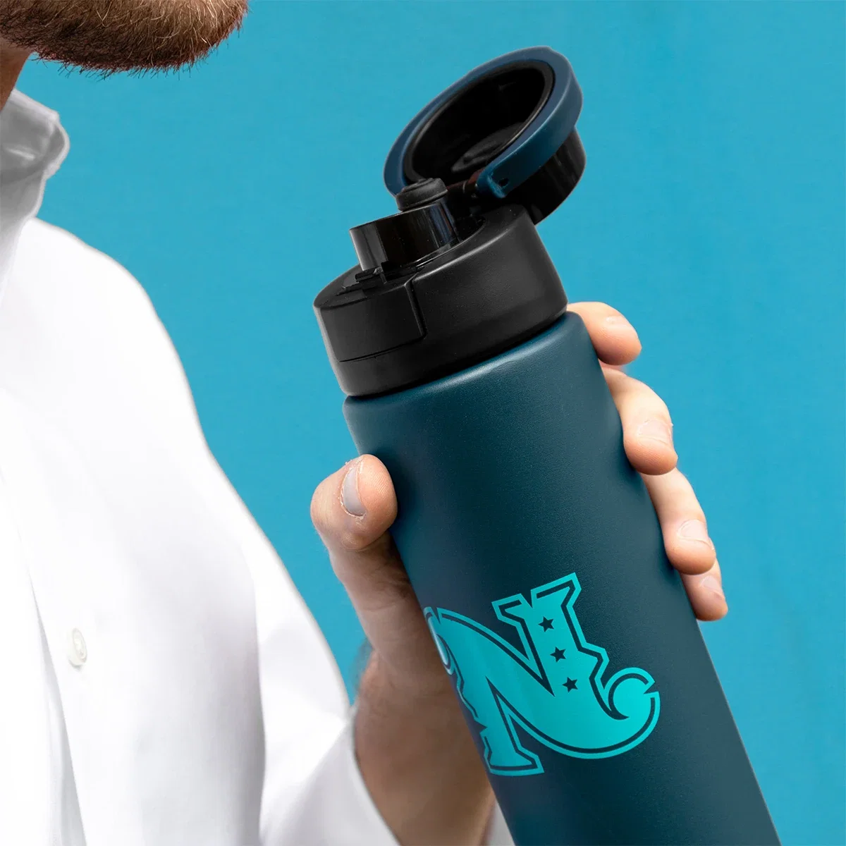 32 Oz. Pop Sip & Chug Recycled Single Wall Stainless Steel Bottle held in hand