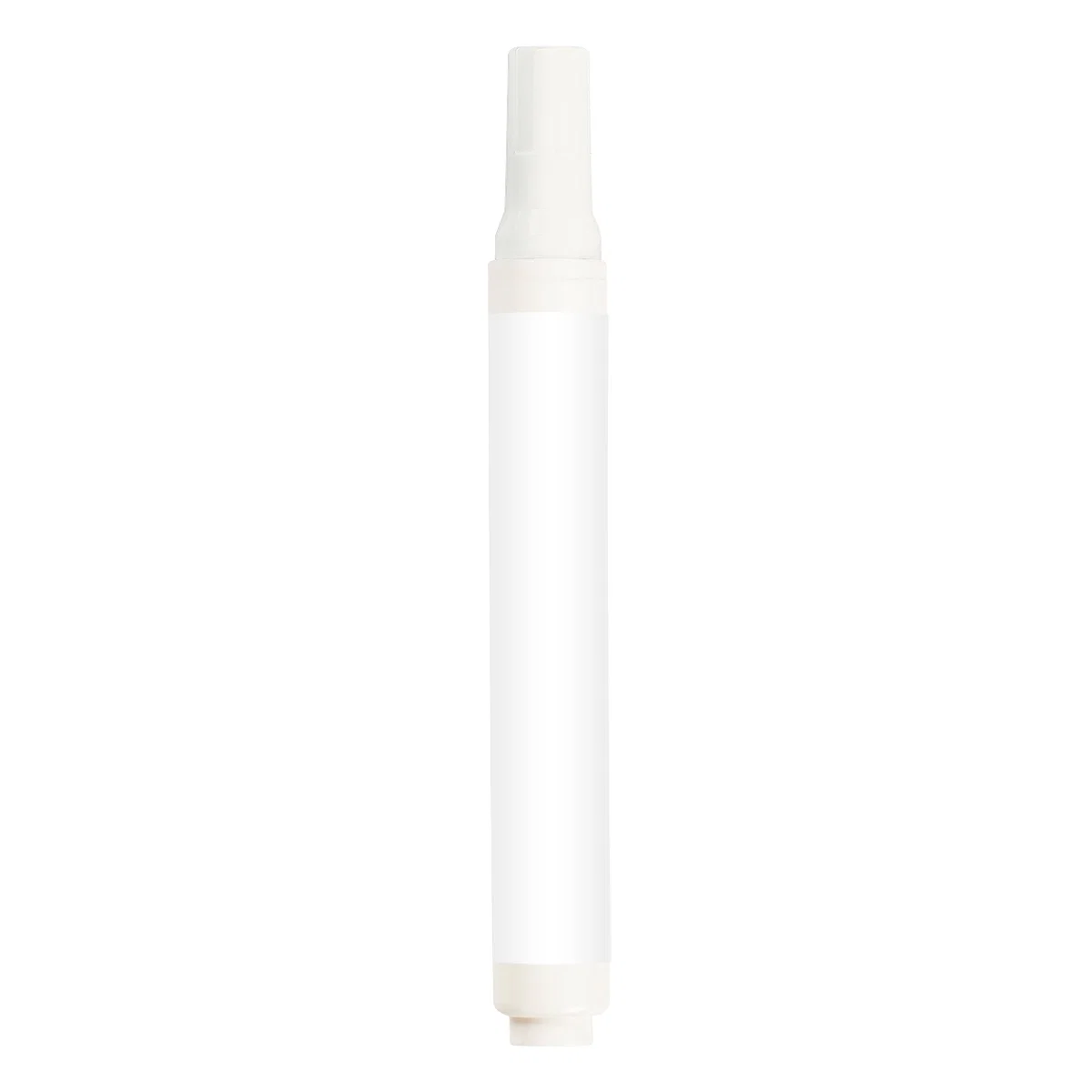 Applicator tip pressed against a spot on fabric