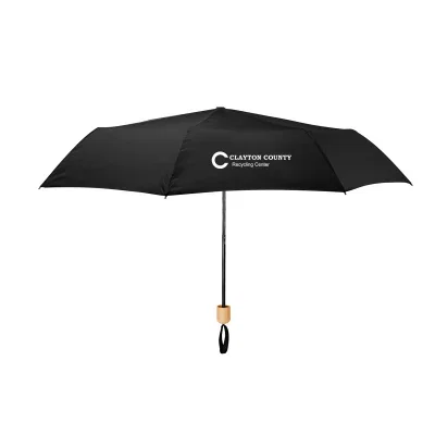 Black umbrella opened to its forty-one inch arc