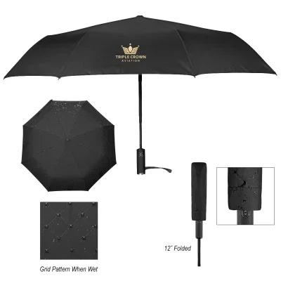 Black folding umbrella opened to a forty-two inch arc