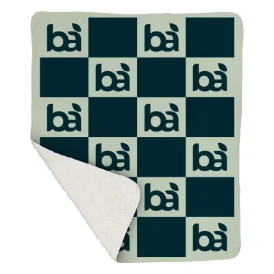White checkerboard knit sherpa blanket measuring 50 by 60 inches