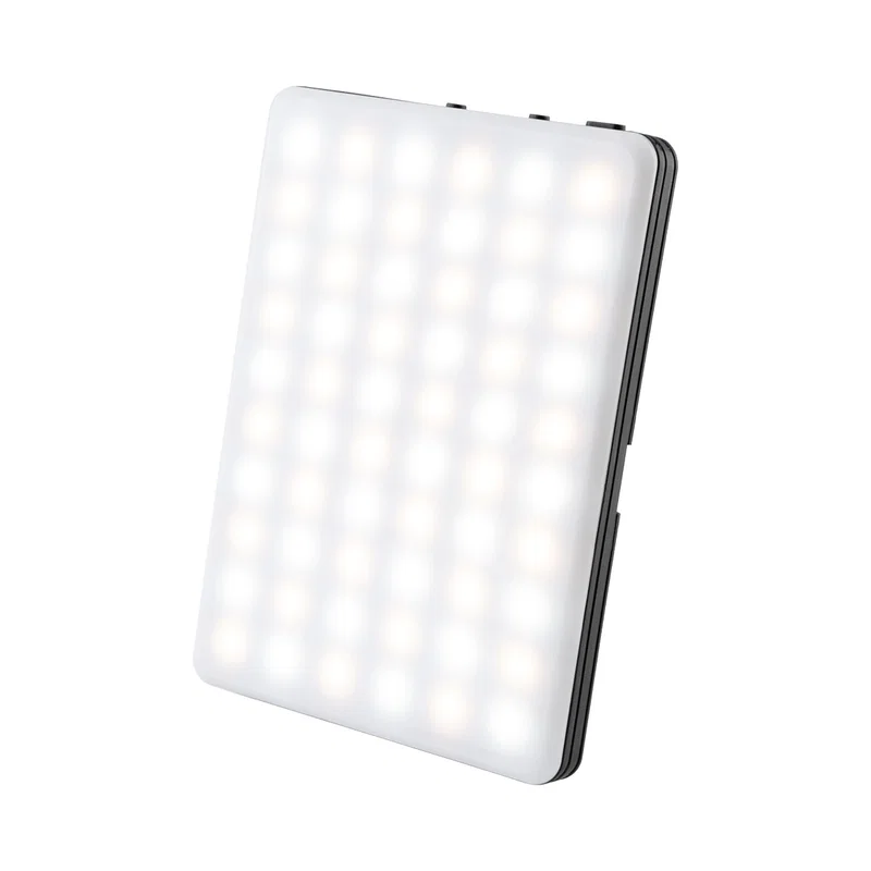 Held at an angle to show the four-inch panel