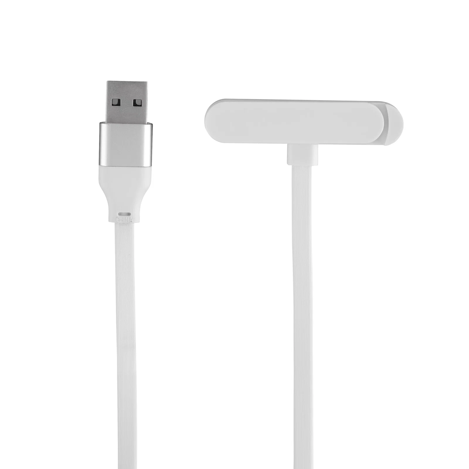 White version coiled loosely on a desk