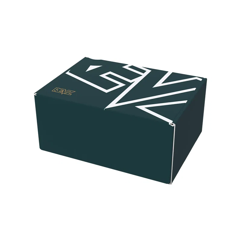 Small corrugated mailer standing closed and ready to pack