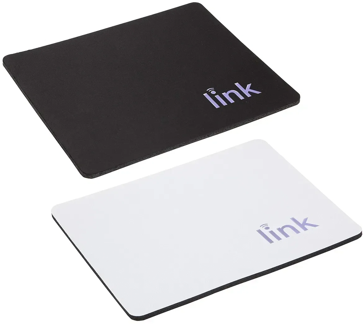 Branded antimicrobial mouse pad shown on an office desk