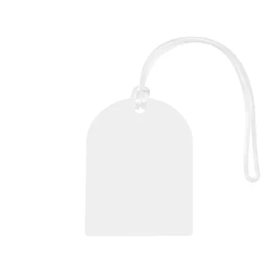 Tag attached to a suitcase handle while traveling