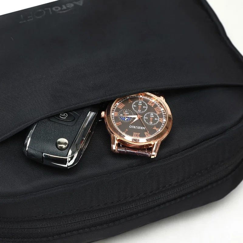 Aero LOFT Crossbody Bag interior compartments and pockets, detail view