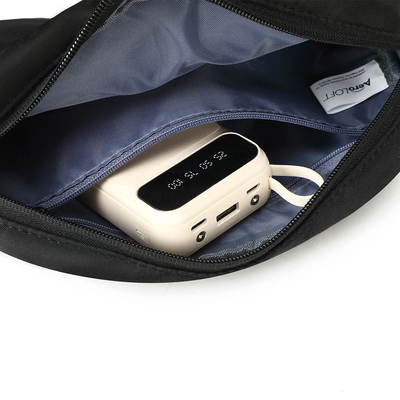 Aero LOFT Crossbody Companion Bag laid flat, angled overhead view