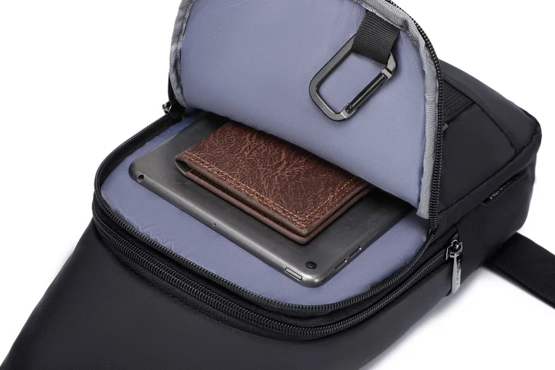 Angled view of the custom Aero LOFT Anywhere Crossbody Mini Backpack showing the adjustable strap
