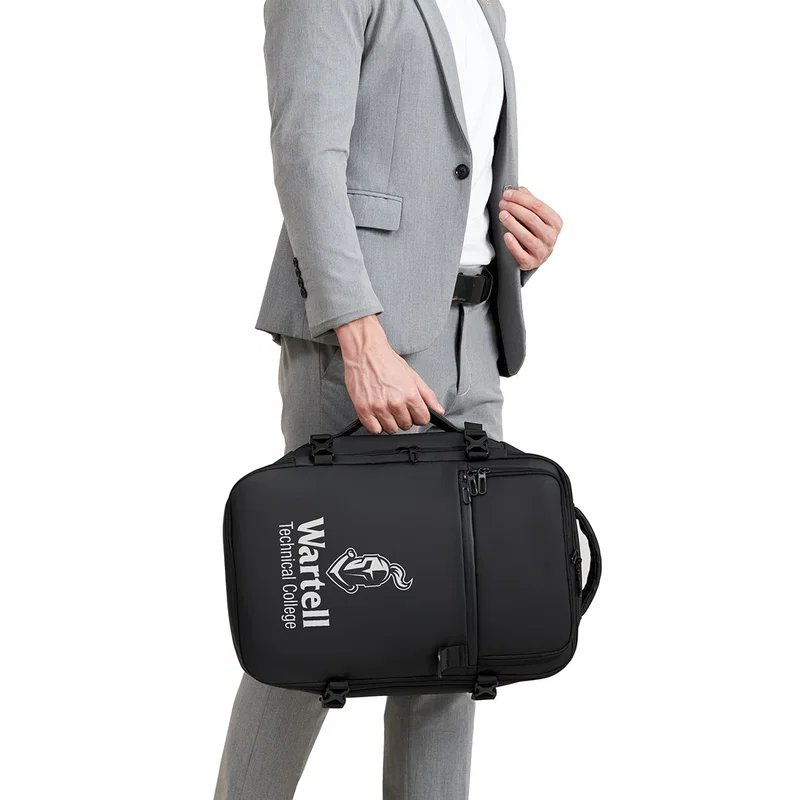 Angled close-up of the branded logo on the Aero LOFT HYBRID Travel Backpack