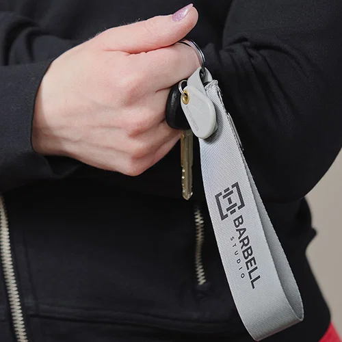 Promotional Aero LOFT keychain carabiner clipped to a bag