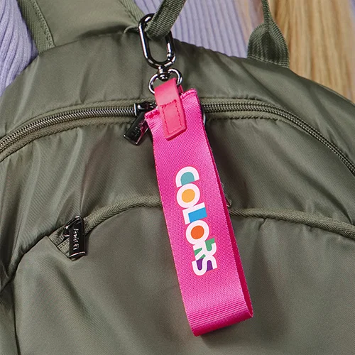 Custom carabiner keychain holding keys, angled view