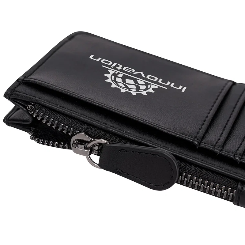 Close-up of the custom Aero LOFT Slim Card Wallet's logo imprint area