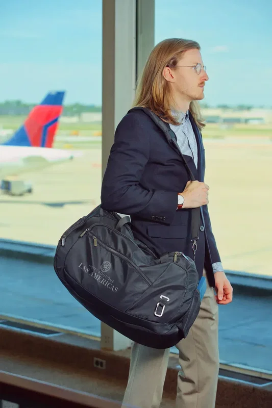 AeroLoft jet black weekender duffel, end pocket detail, promotional travel bag