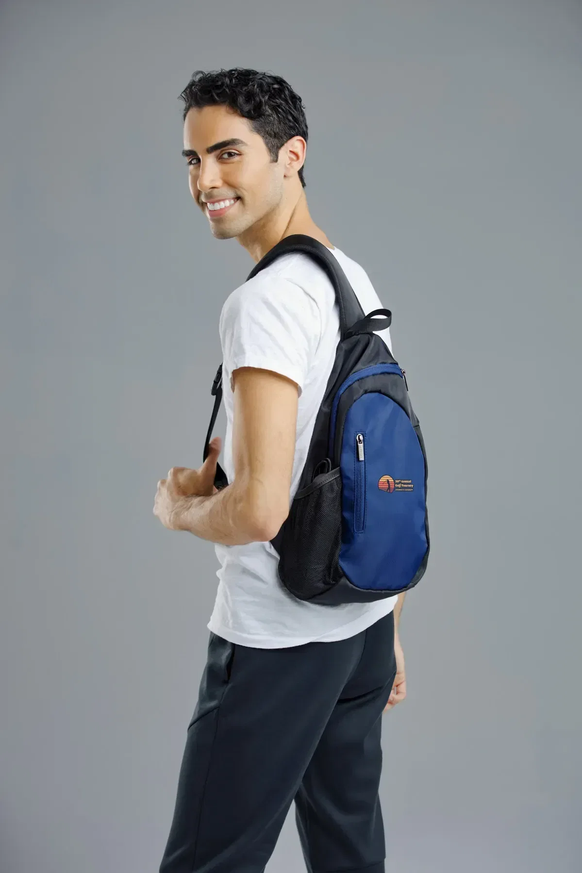 Branded AeroLoft crossbody sling open showing compartments