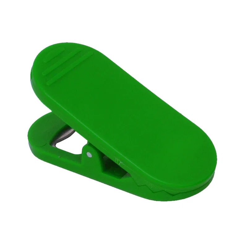 Alligator Magnetic Clip & Bottle Opener. Plastic alligator magnetic clip and bottle opener for kitchen, office, and fridge us