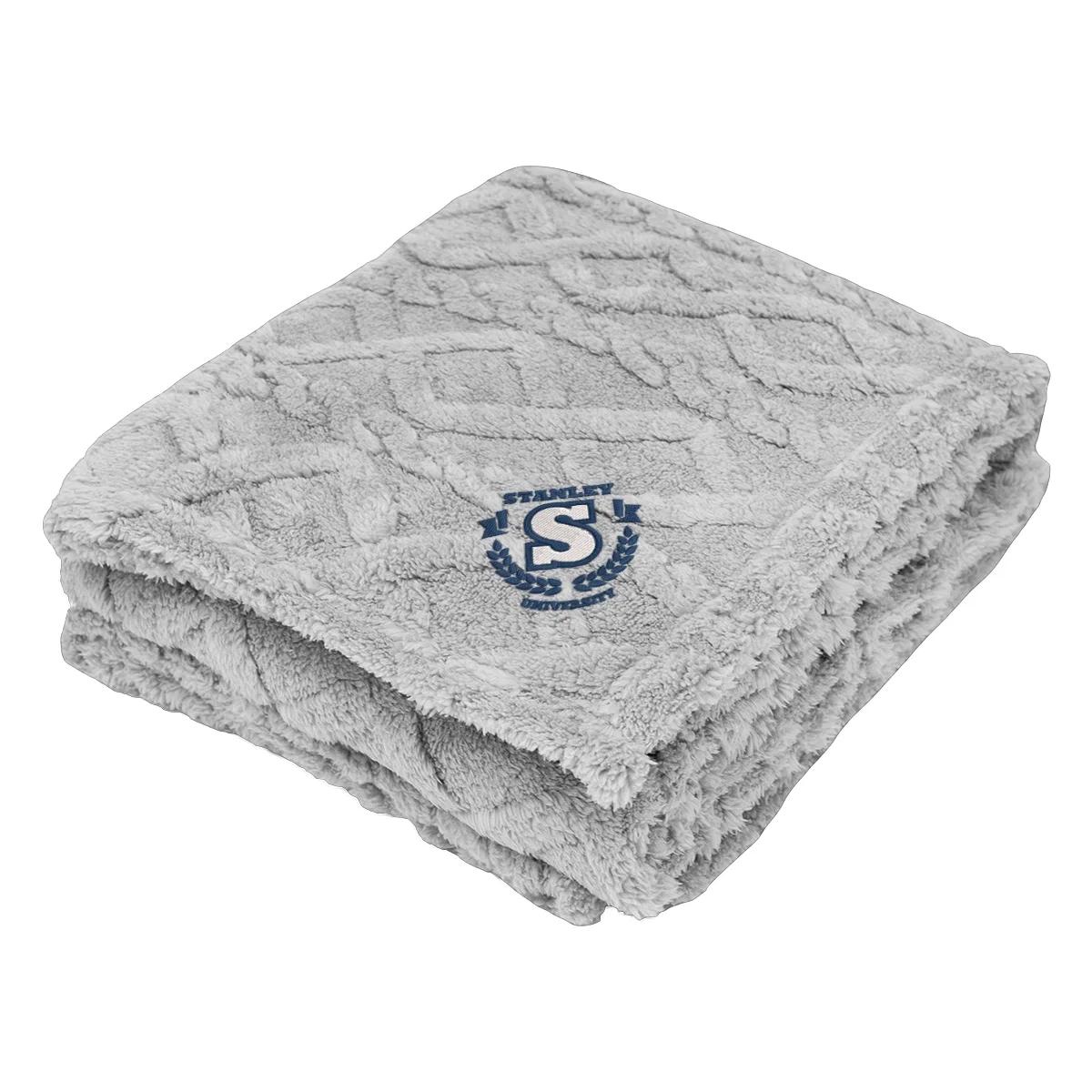 Sherpa blanket folded neatly with the fleece side facing up