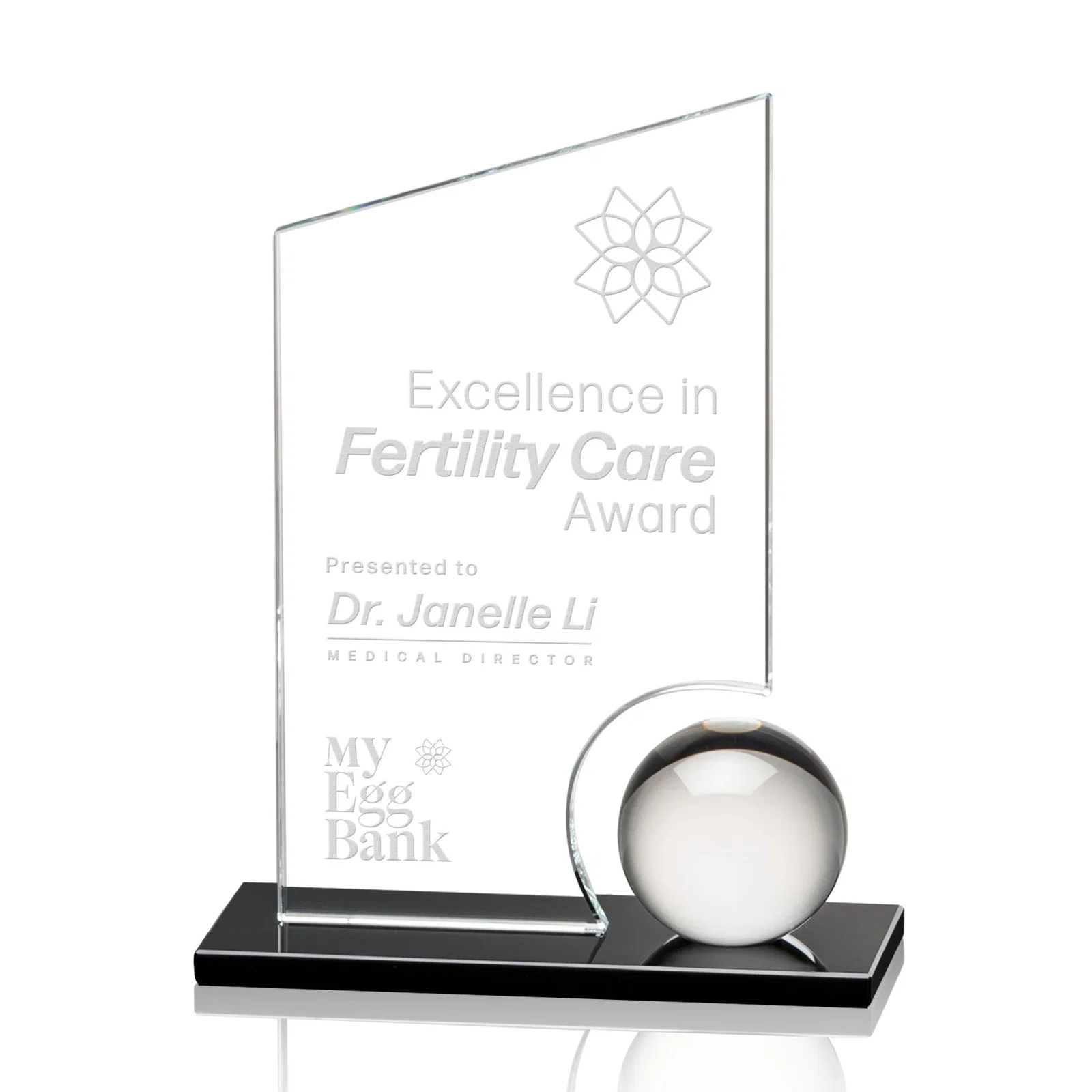 Custom Crystal Orb Award Surrounded by a Starfire Crystal Peak for corporate award ceremonies