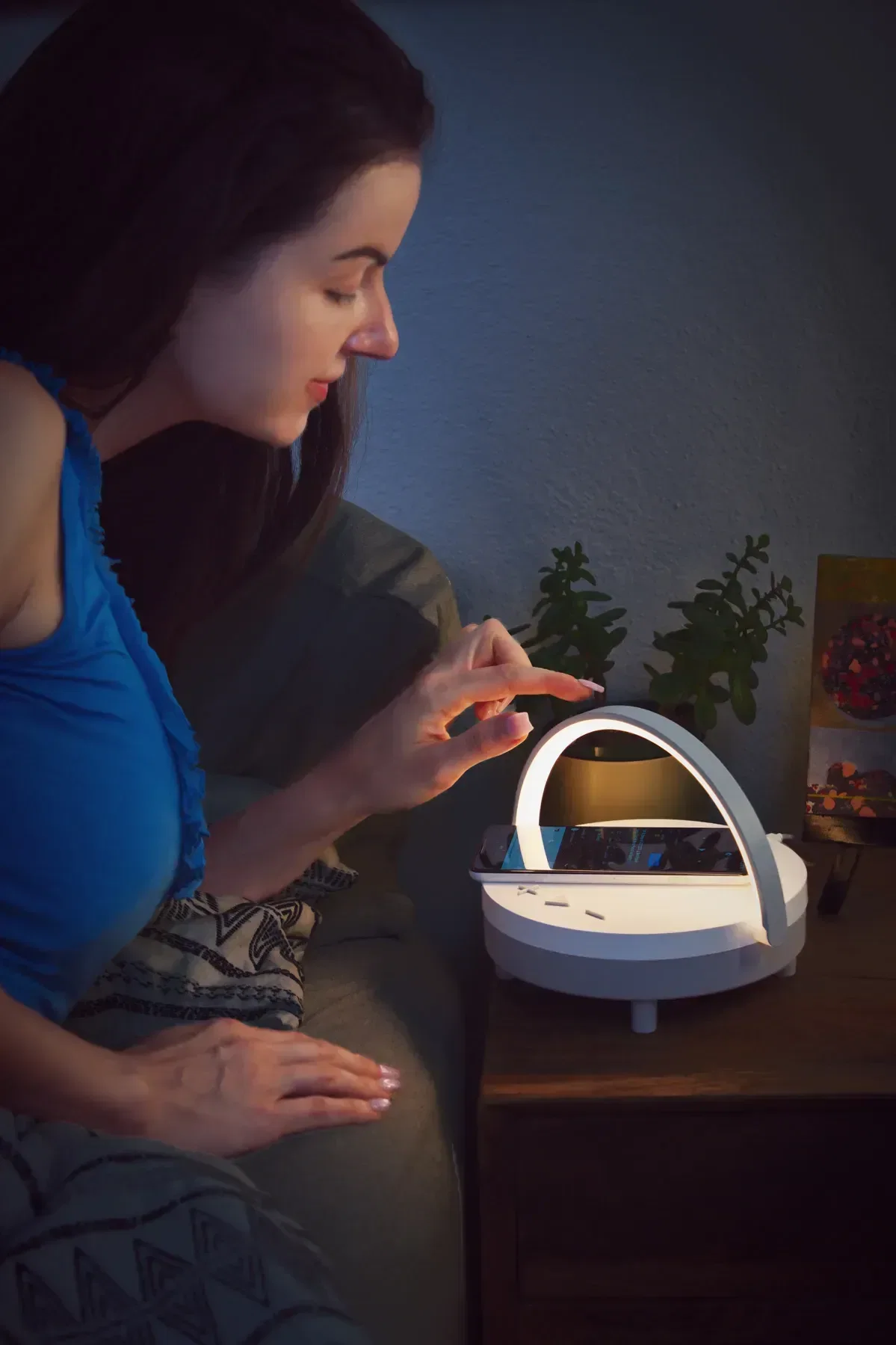 Archway Wireless Speaker with 5W Charger in use
