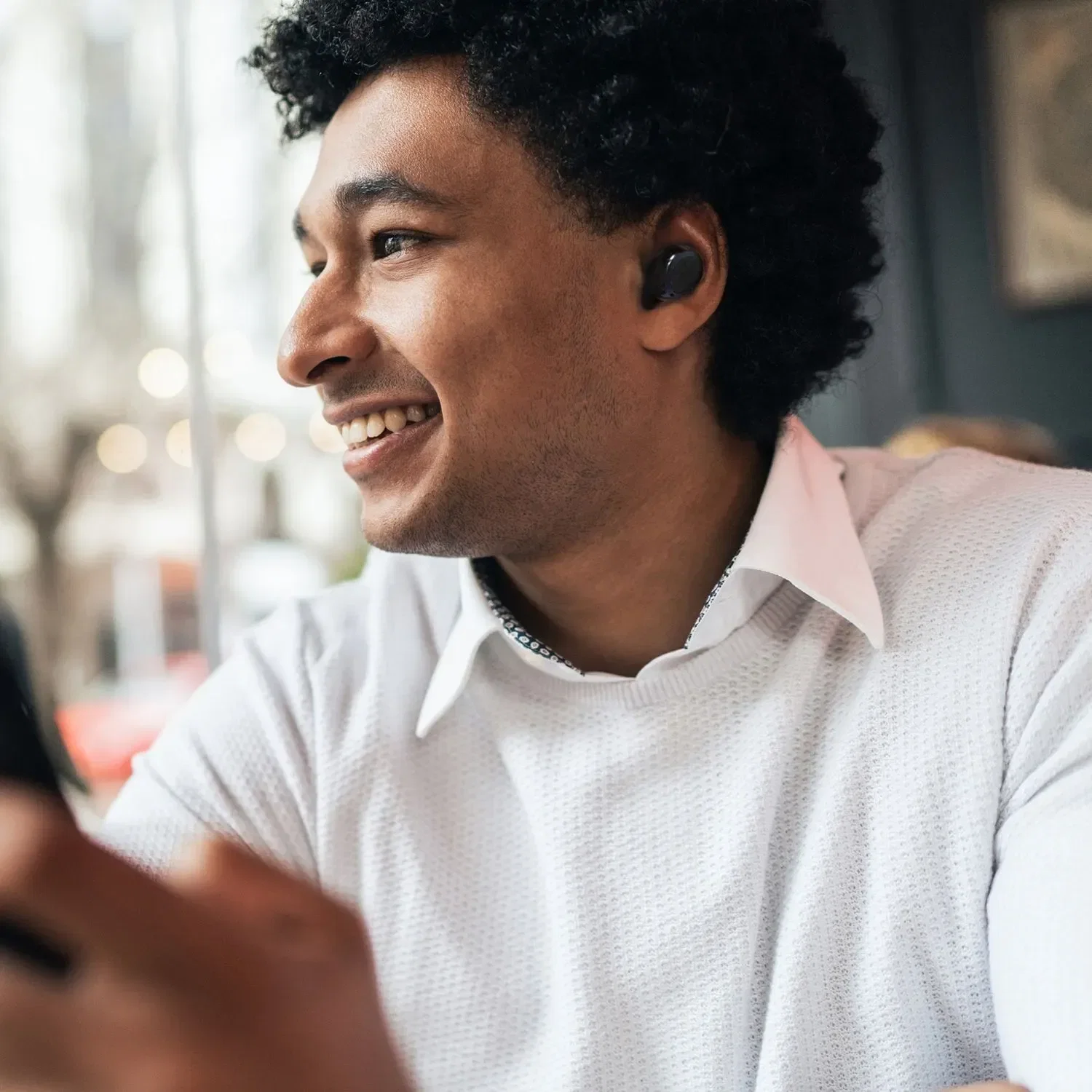 Aria T3S Wireless Noise Cancelling Ear Buds in use