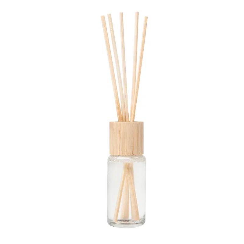 Reed sticks fanning out from the narrow bottle neck