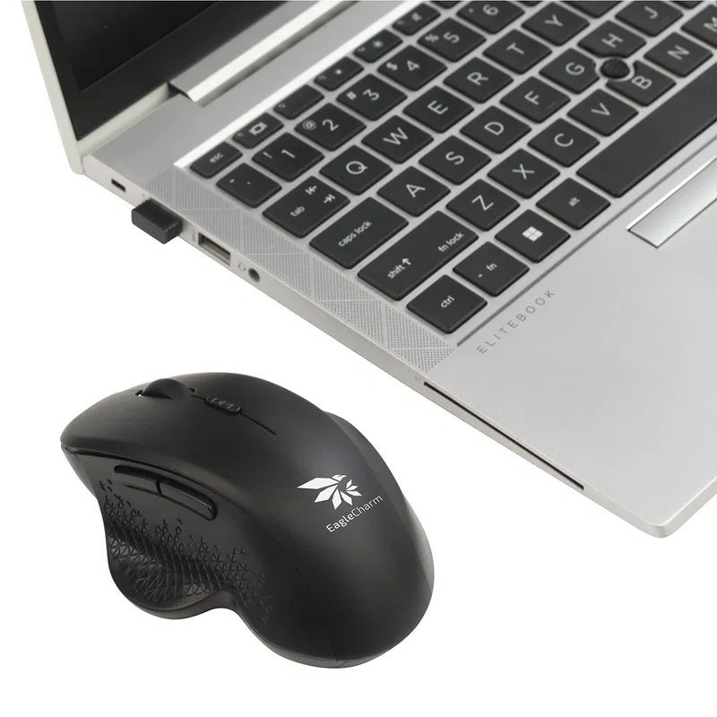 Side profile of the Ascent Wireless Mouse showing its ergonomic contour