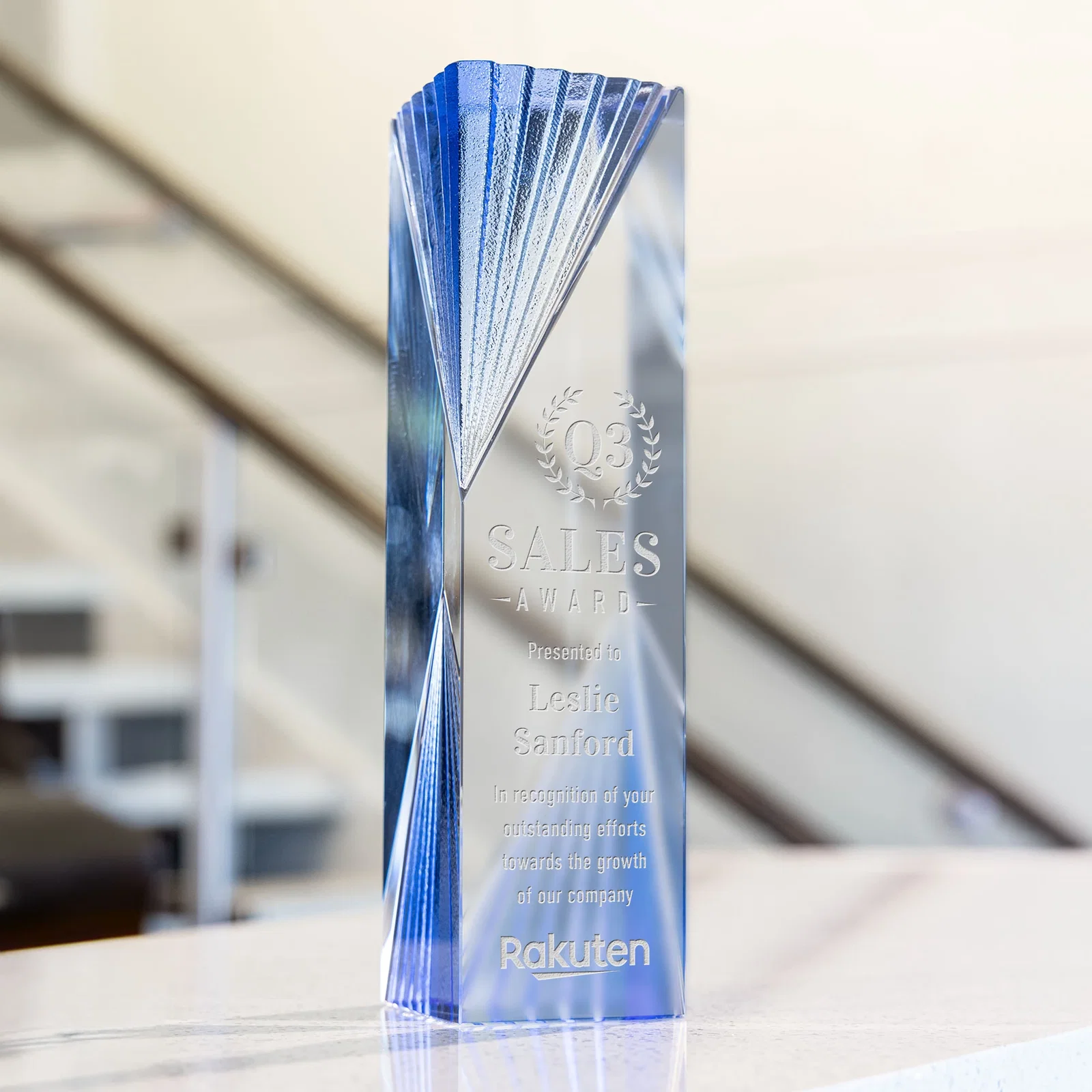 Custom Optical Crystal Tower Award With Blue Corner Accents for retirement presentations