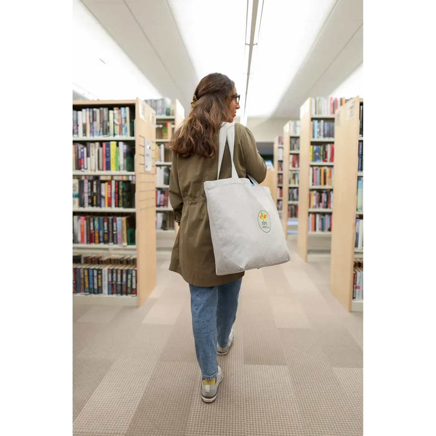 AWARE™ Recycled Cotton Shopper Tote Bag with Interior Zip Pocket held in hand