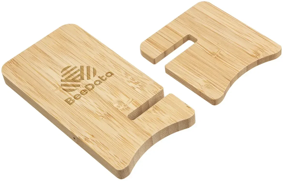 Branded bamboo wireless charging stand holding a phone upright