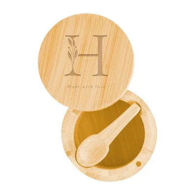 Round bamboo salt cellar measuring under three inches across