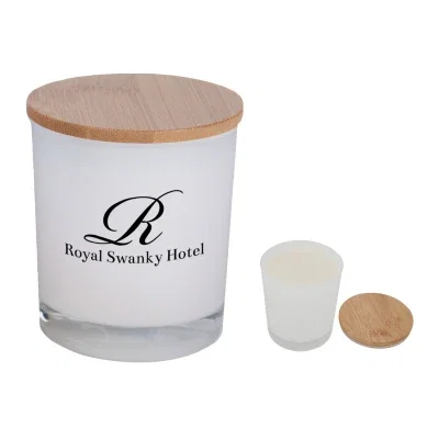 Soy candle in a tumbler topped with a bamboo lid
